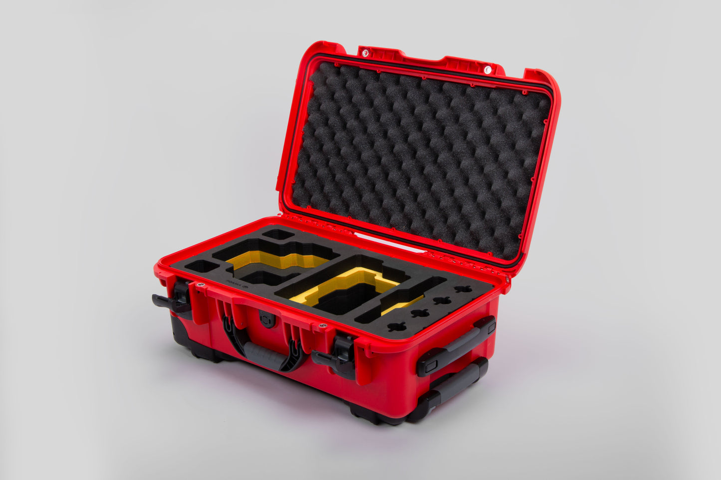 Angle view of Red Color RED V Raptor Carry-On Case with Yellow Layer Custom Foam Insert