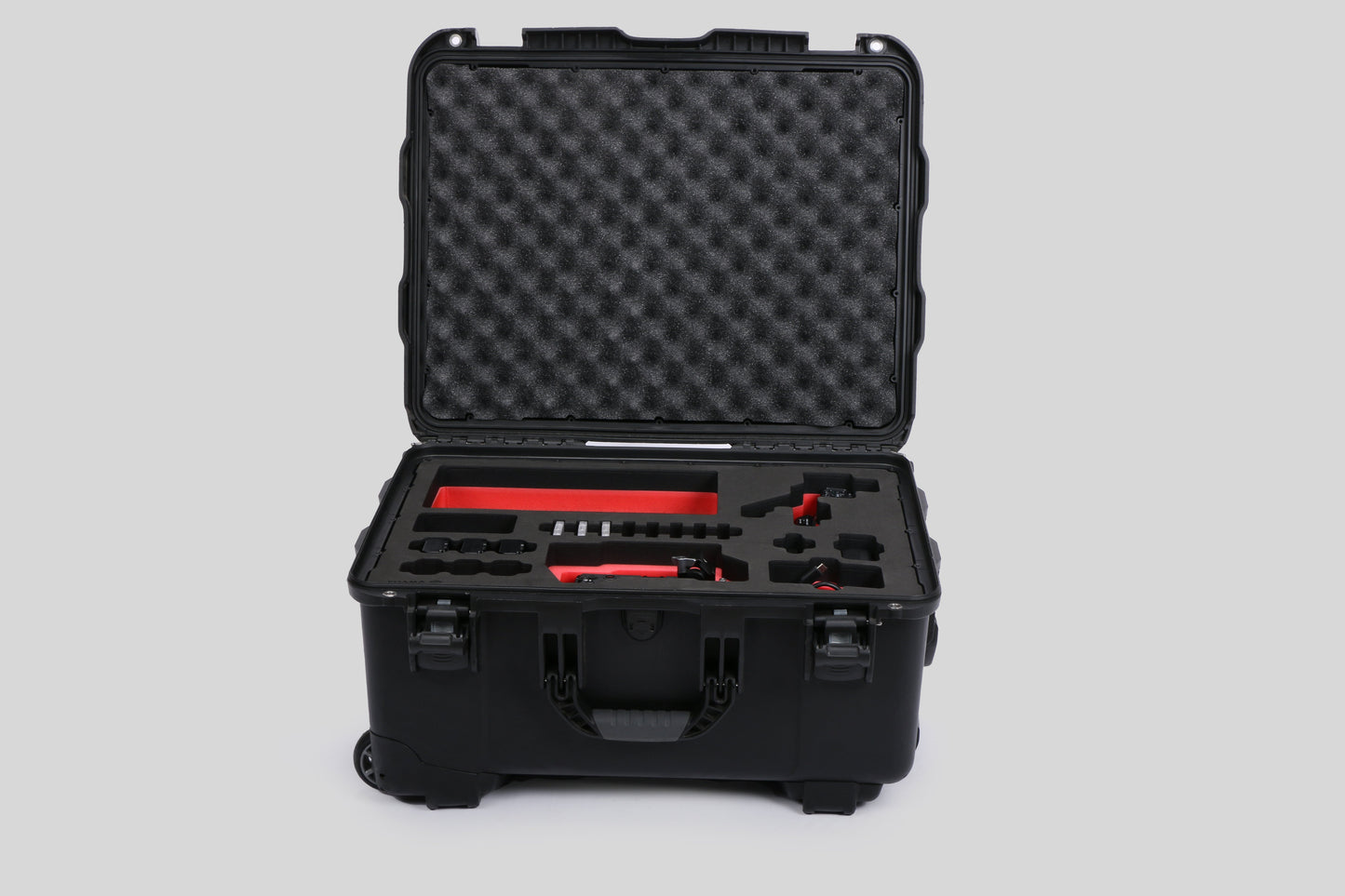 Front view of Sony FX3 and accessories in Black Color Studio Case and Custom Foam Insert with a red layer