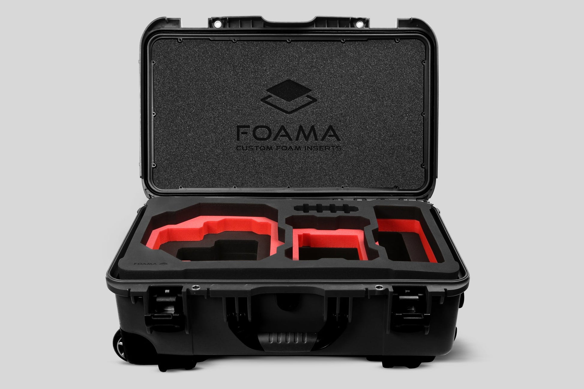 Front view of Foama Black Color Carry-on case and Custom Foam Insert with Red Layer for RED Komodo-X