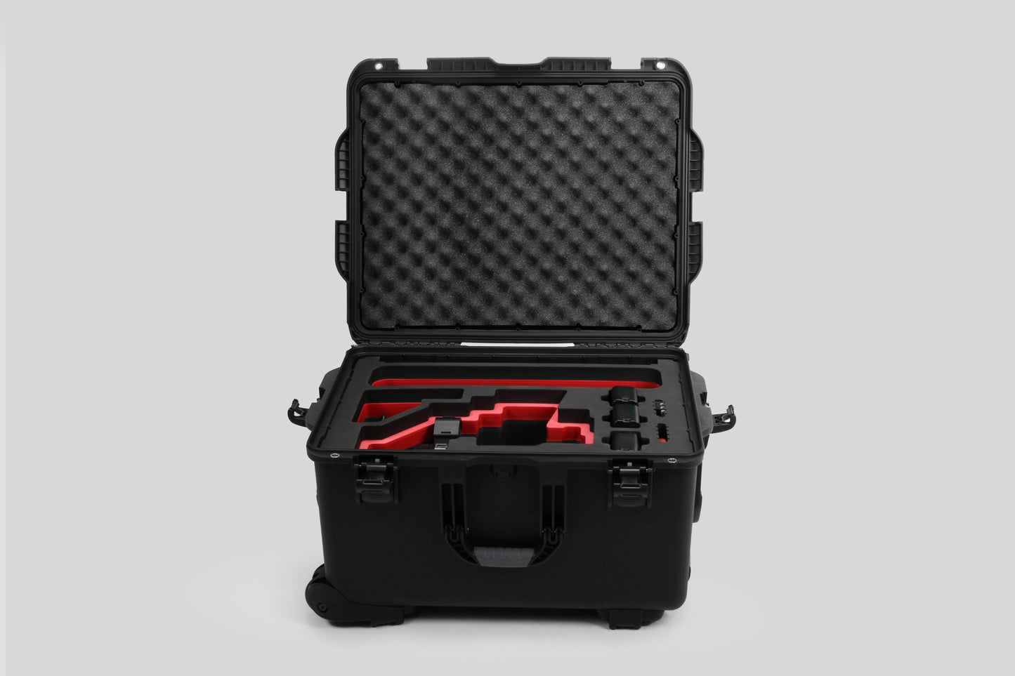 Front view of Sony FX6 and accessories in Black Color Studio Case and Custom Foam Insert with a Red Layer