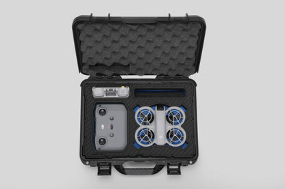 Top view of Foama black all-weather carry-on case with stylish blue layer insert, holding DJI Neo