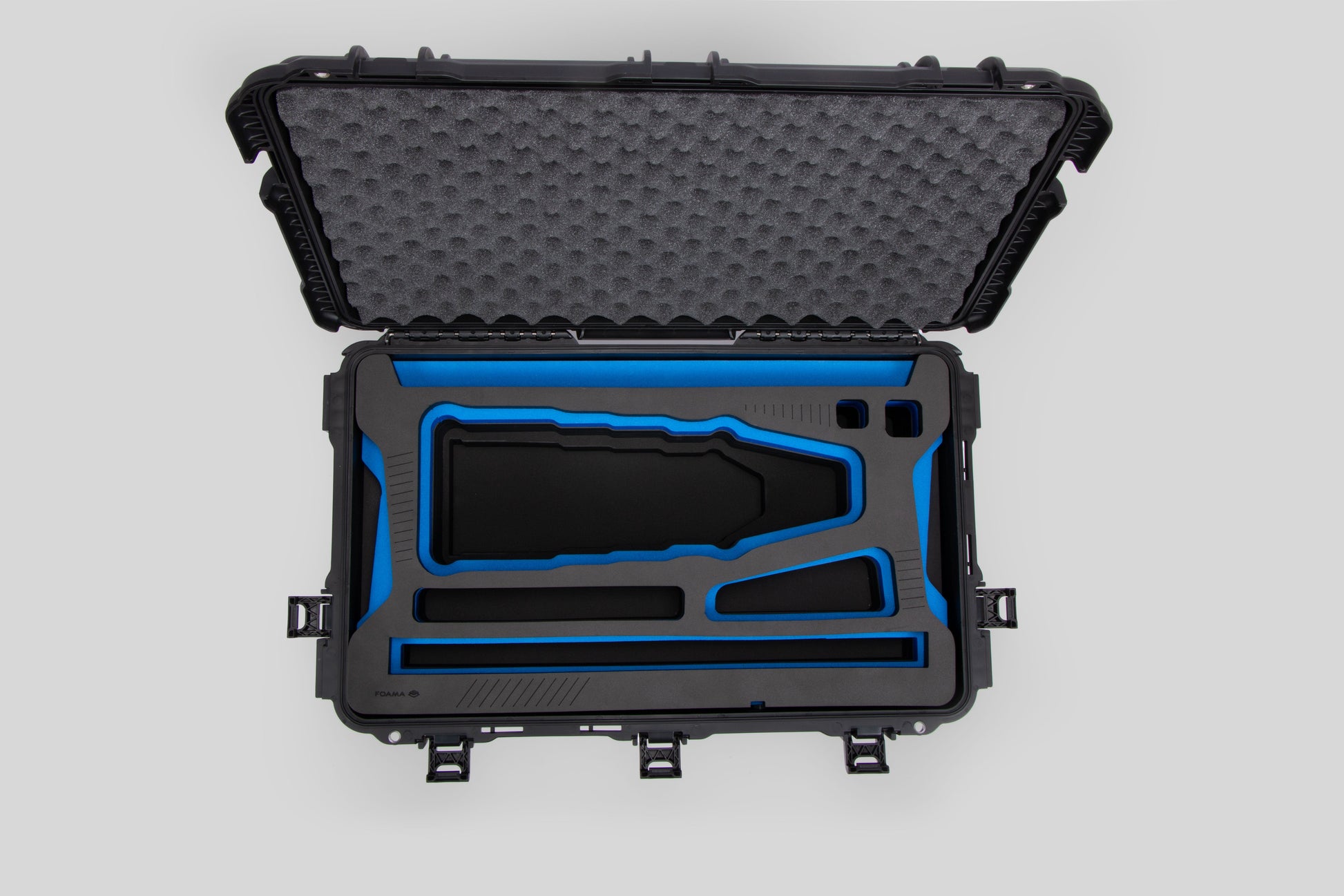 Top view of Black Color Optimo 24-290mm Heavy-Duty Lens Case and Blue Layer Custom Foam Insert
