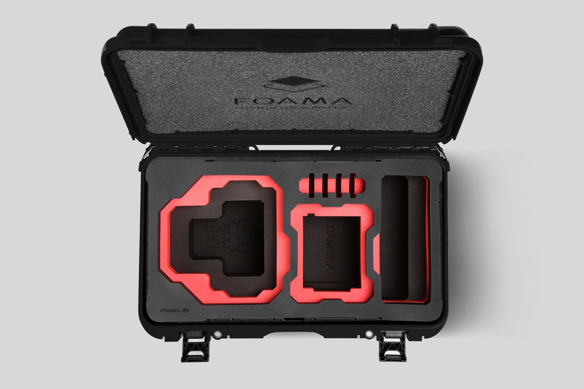 Top view of Foama Black Color Carry-on case and Custom Foam Insert with Red Layer for RED Komodo-X