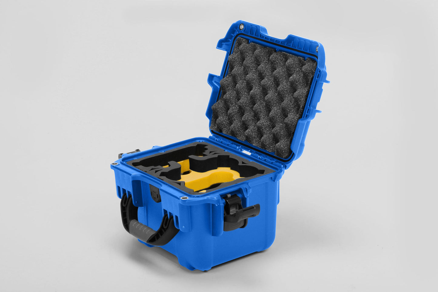 Angled view of DJI Neo Blue Color Adventure Ready Compact Waterproof Carry-on Case and Custom Foam Insert with a Yellow Layer for DJI Neo Combo