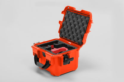 Angled view of DJI Neo Orange Color Adventure Ready Compact Waterproof Carry-on Case and Custom Foam Insert with a Red Layer for DJI Neo Combo