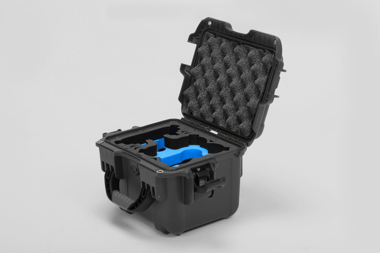 Angled view of DJI Neo Black Color Adventure Ready Compact Waterproof Carry-on Case and Custom Foam Insert with a Blue Layer for DJI Neo