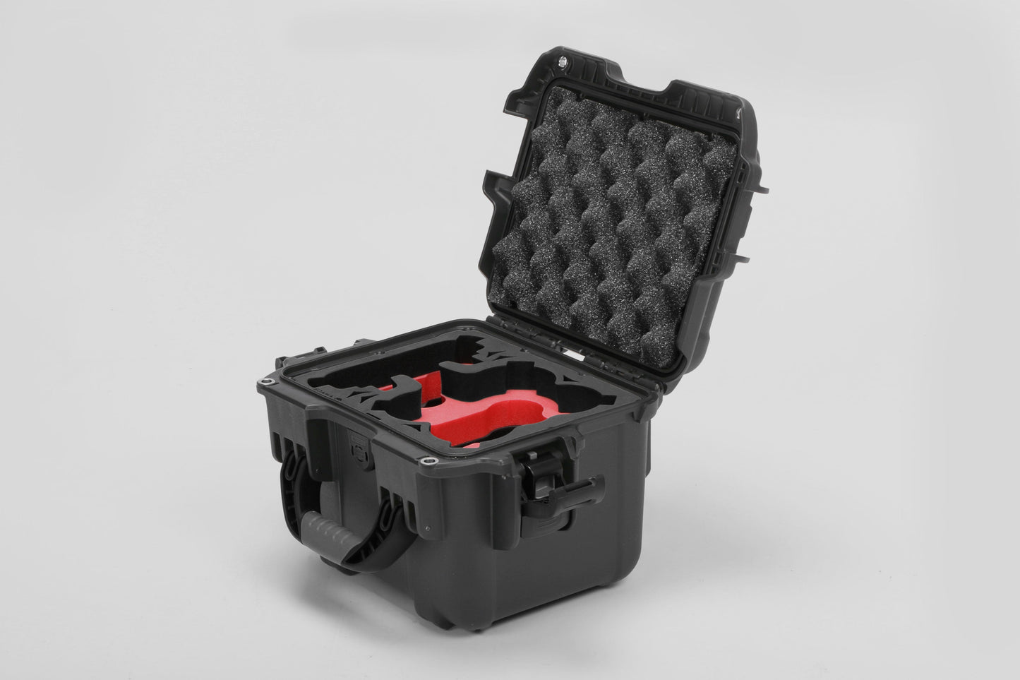 Angled view of DJI Neo Black Color Adventure Ready Compact Waterproof Carry-on Case and Custom Foam Insert with a Red Layer for DJI Neo