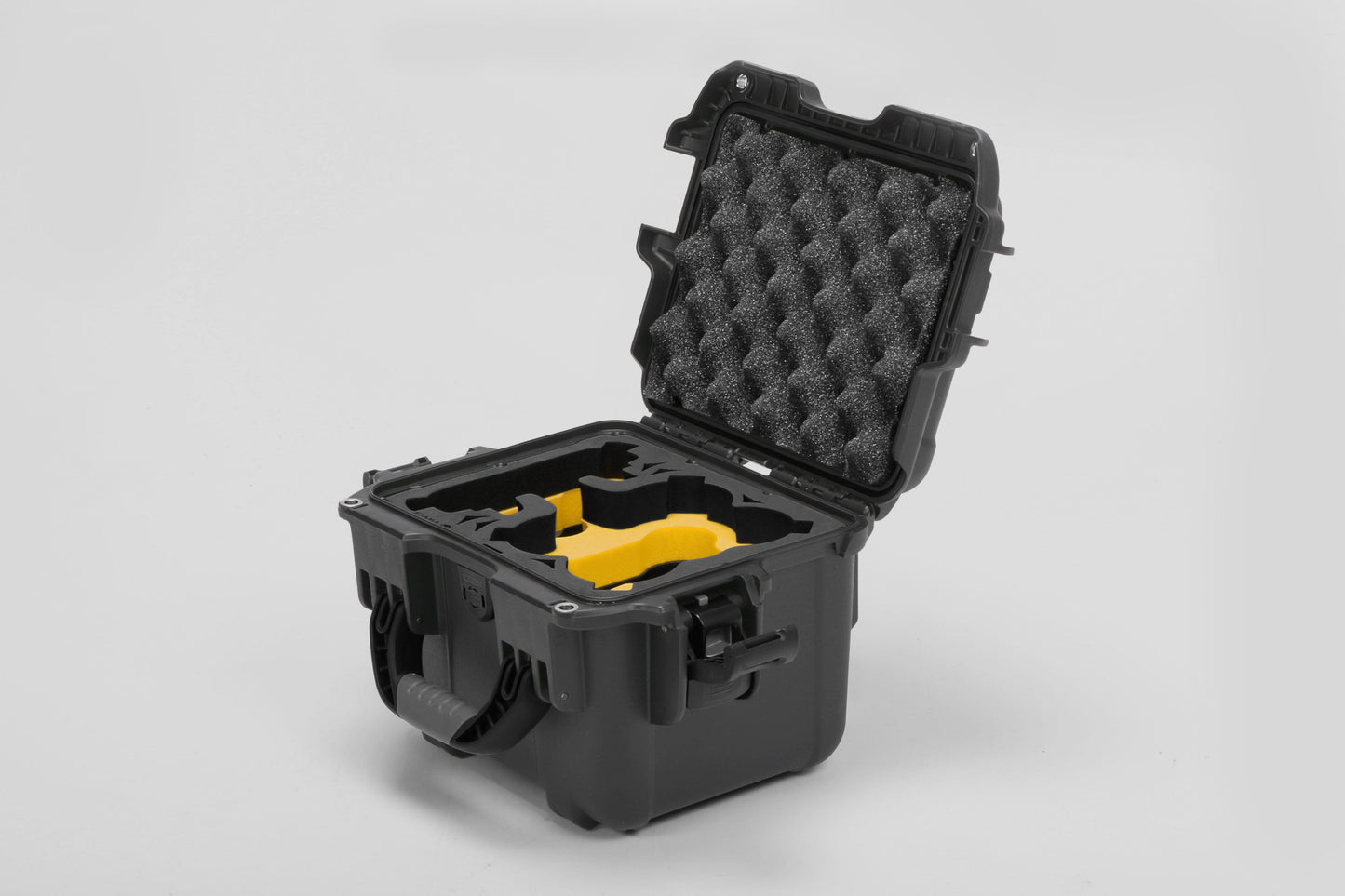Angled view of DJI Neo Black Color Adventure Ready Compact Waterproof Carry-on Case and Custom Foam Insert with a Yellow Layer for DJI Neo