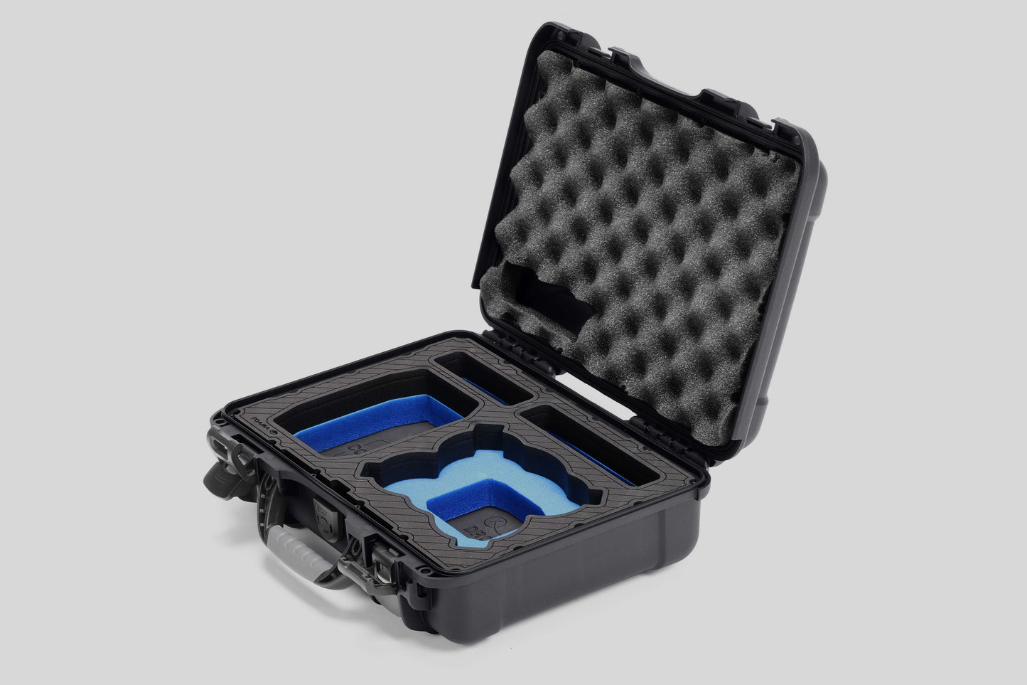 Angled view of Foama Graphite Color All-Weather Carry-on Case and Custom Foam Insert with a Blue Layer for DJI Neo