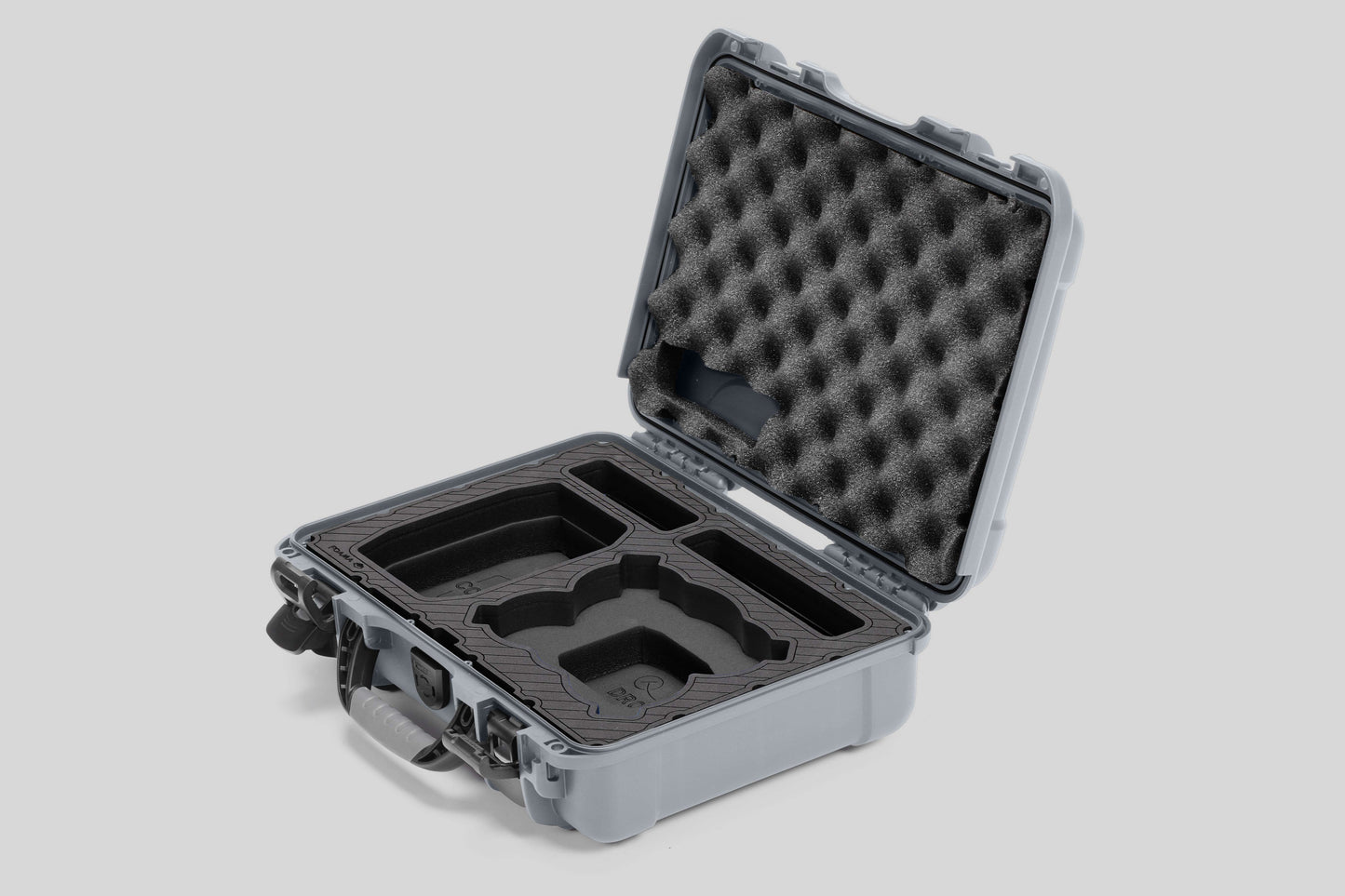 Angled view of Foama Silver Color All-Weather Carry-on Case and Black Custom Foam Insert for DJI Neo