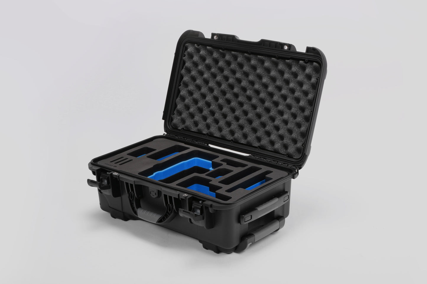 Angled view of Foama Black Color Travel Case and Custom Foam Insert with Blue Layer for RED Monstro