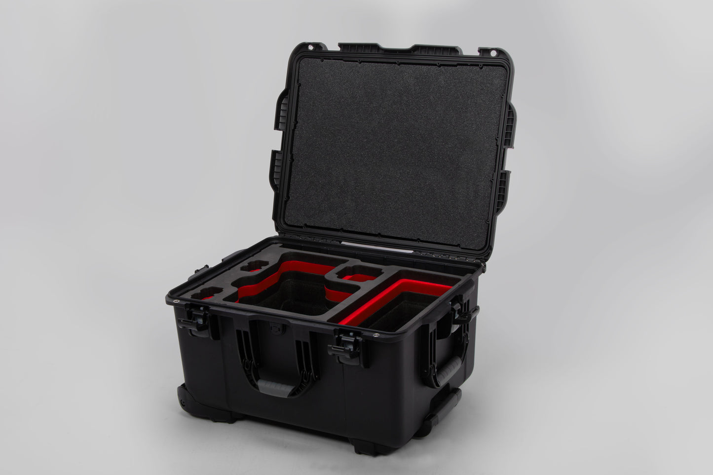Angled view of ARRI Alexa 35 Black Color Studio Case with Custom Foam Red Layered Insert