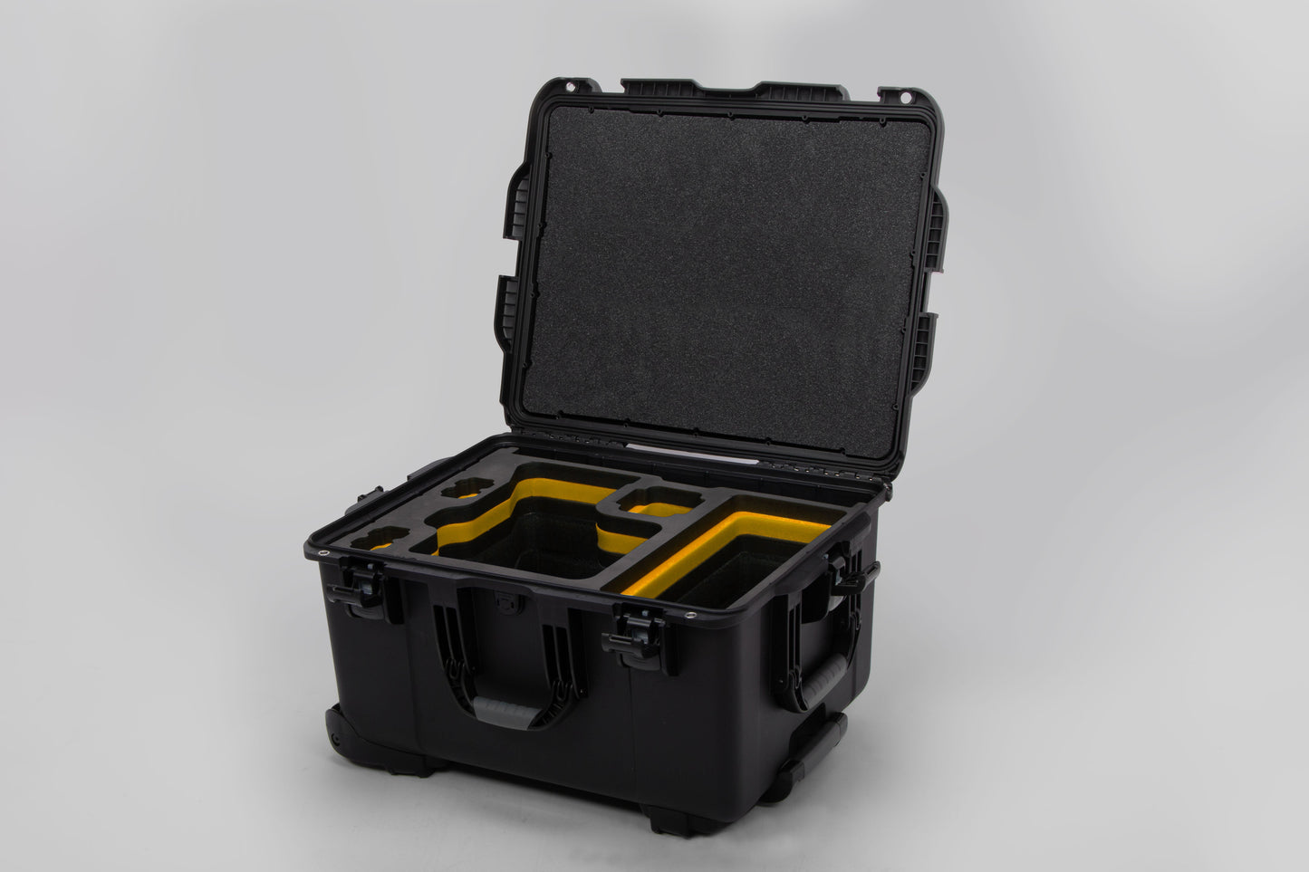 Angled view of ARRI Alexa 35 Black Color Studio Case with Custom Foam Yellow Layered Insert