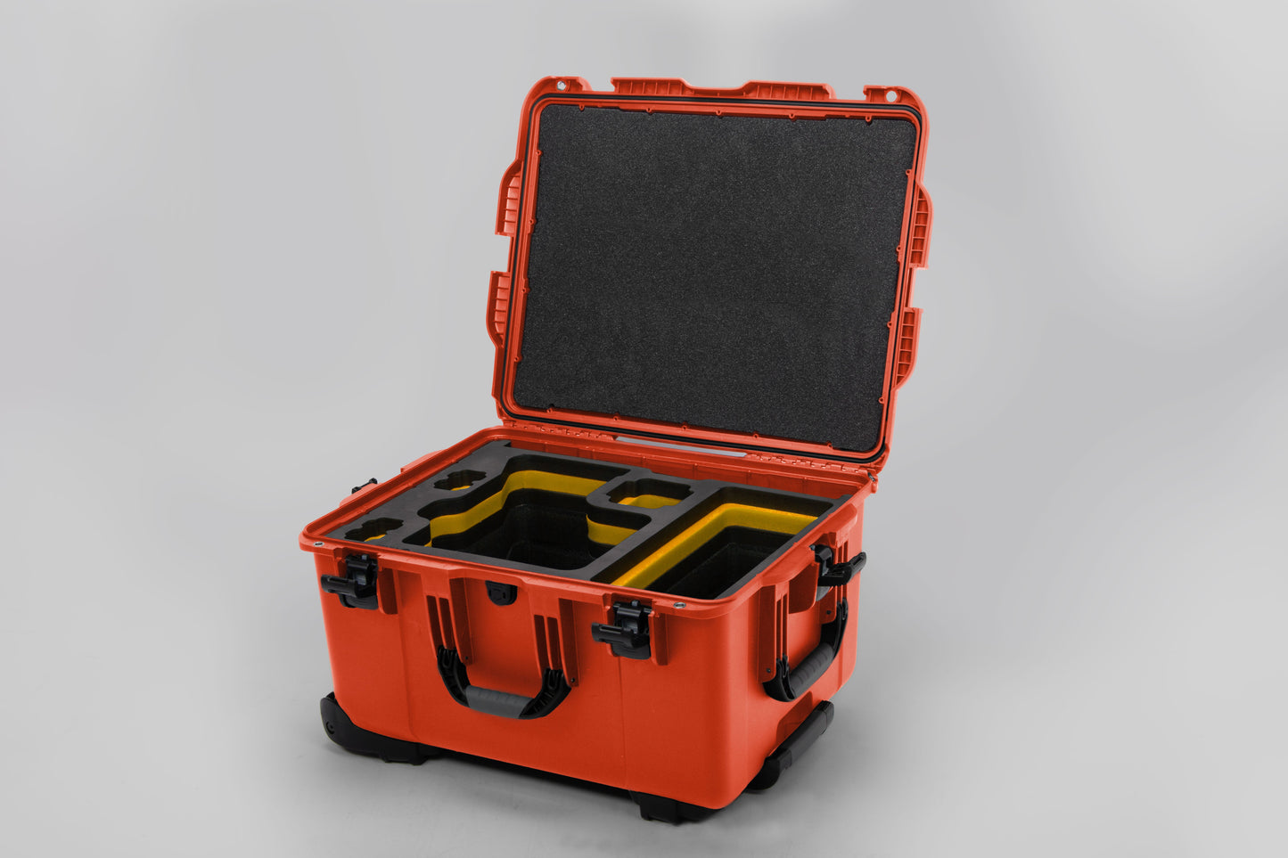 Angled view of ARRI Alexa 35 Orange Color Studio Case with Yellow Layer Custom Foam Insert