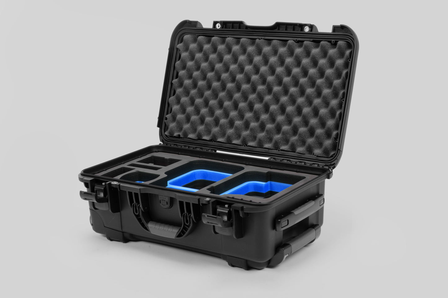 Angle view of Black Color Canon C400 Camera Carry-on Case and Blue Layer Custom Foam Insert