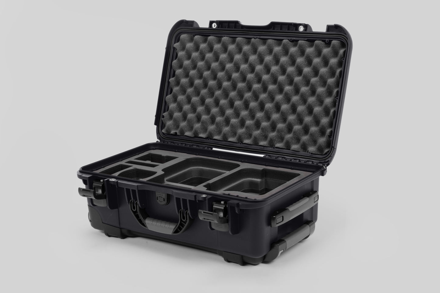Angle view of Graphite Color Canon C400 Camera Carry-on Case and Black Layer Custom Foam Insert