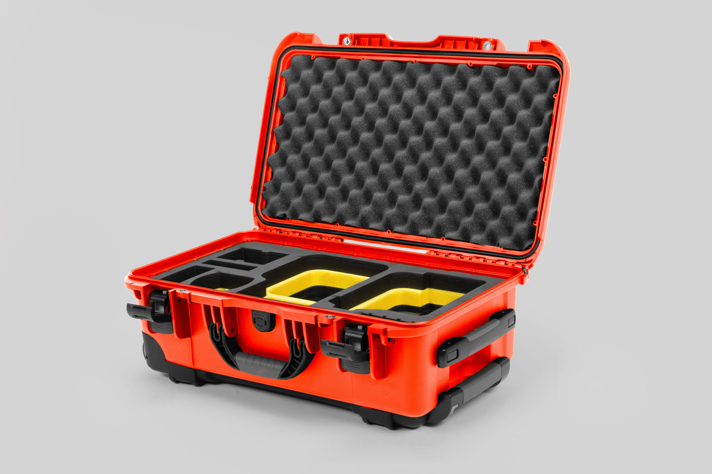 Angle view of Orange Color Canon C400 Camera Carry-on Case and Yellow Layer Custom Foam Insert
