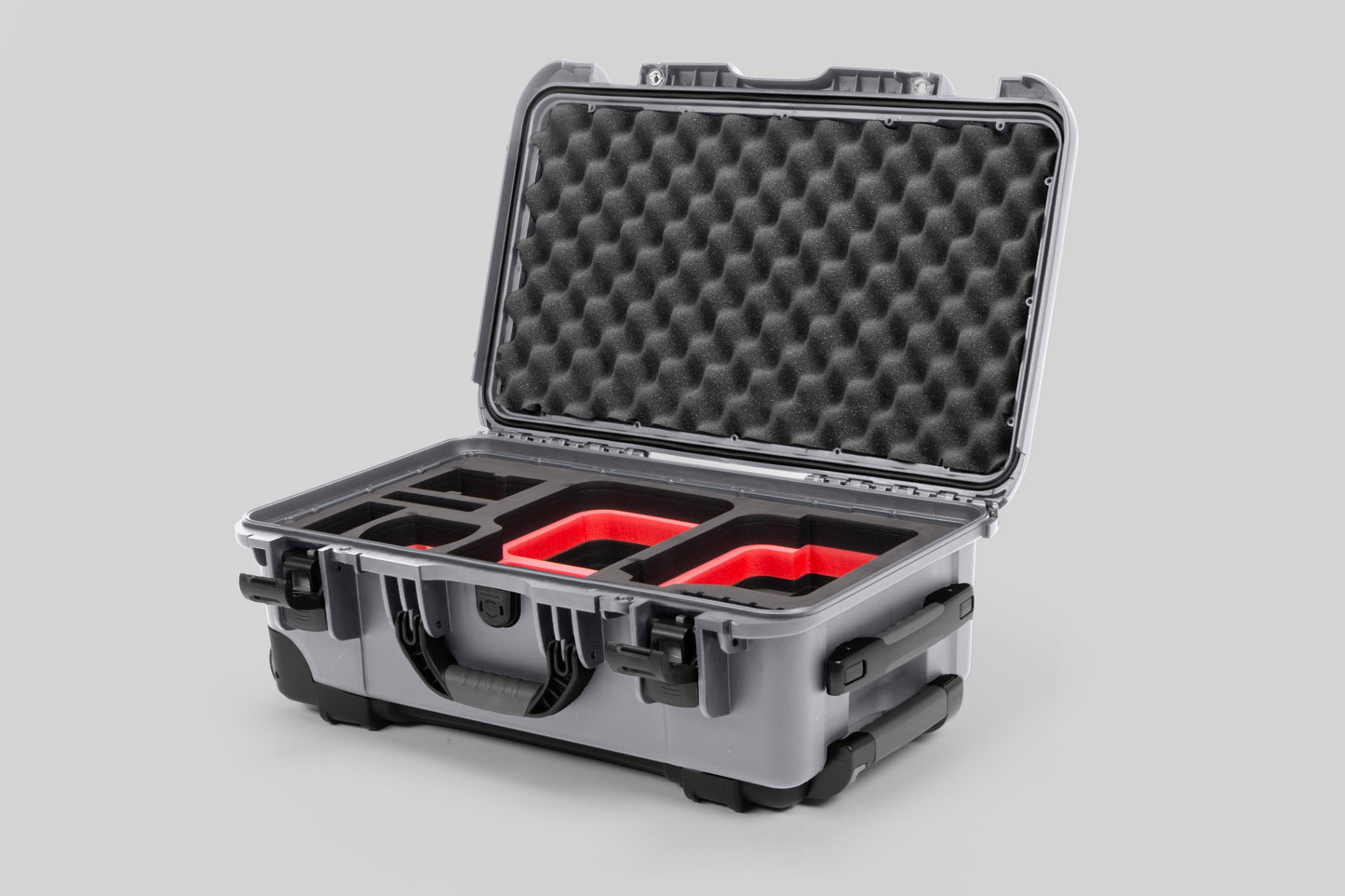 Angle view of Silver Color Canon C400 Camera Carry-on Case and Red Layer Custom Foam Insert