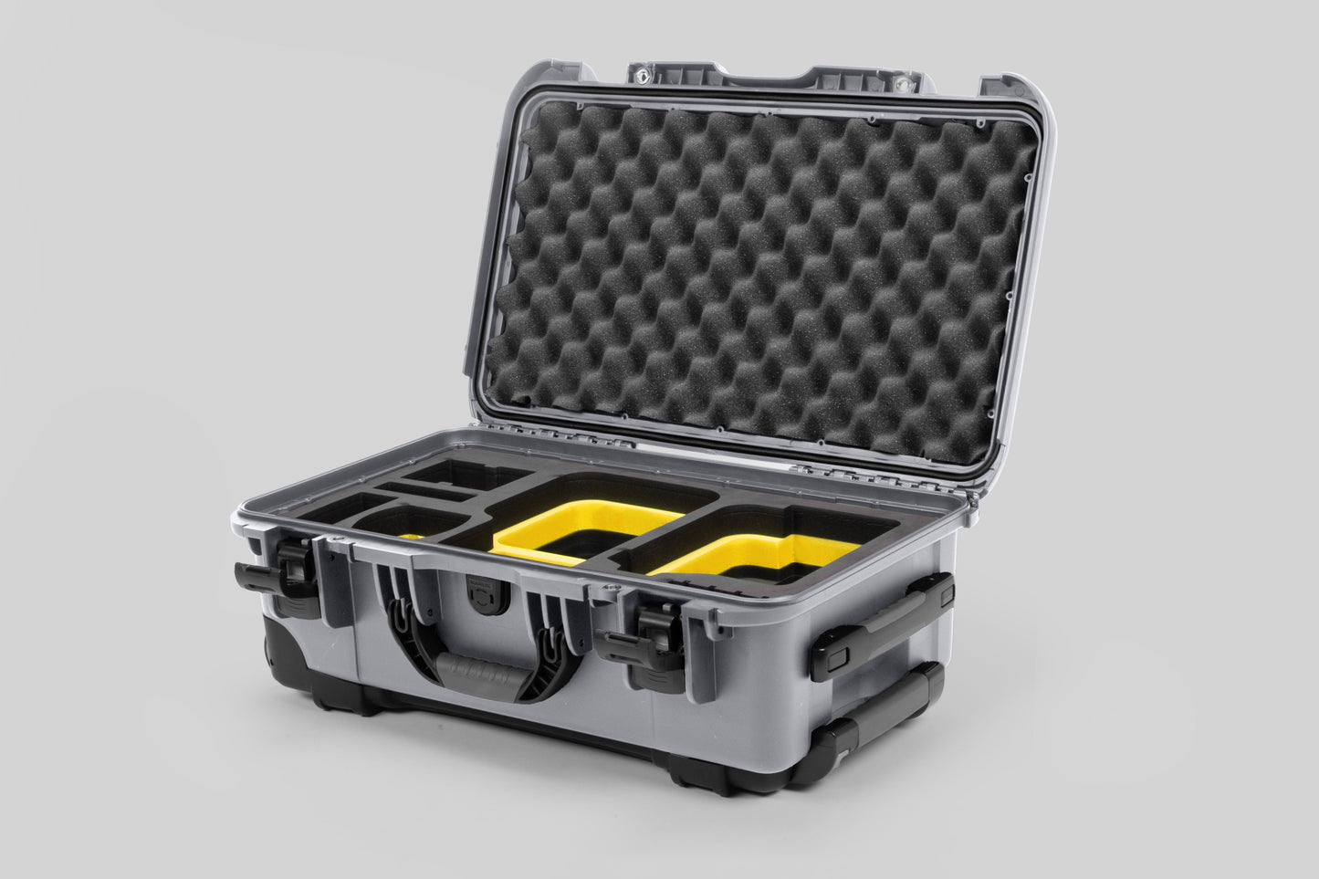 Angle view of Silver Color Canon C400 Camera Carry-on Case and Yellow Layer Custom Foam Insert