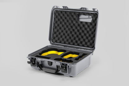 Angled view of DJI Avata 2 Fly More Combo Silver Color Waterproof Hard Case and Custom Foam Insert with a Yellow Layer