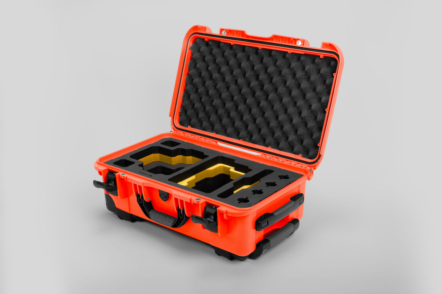 Angle view of Orange Color RED V Raptor Carry-On Case with Yellow Layer Custom Foam Insert