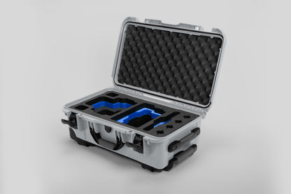 Angle view of Silver Color RED V Raptor Carry-On Case with Blue Layer Custom Foam Insert