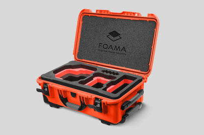 Angled view of Foama Orange Color Carry-on case and Custom Foam Insert with Red Layer for RED Komodo-X