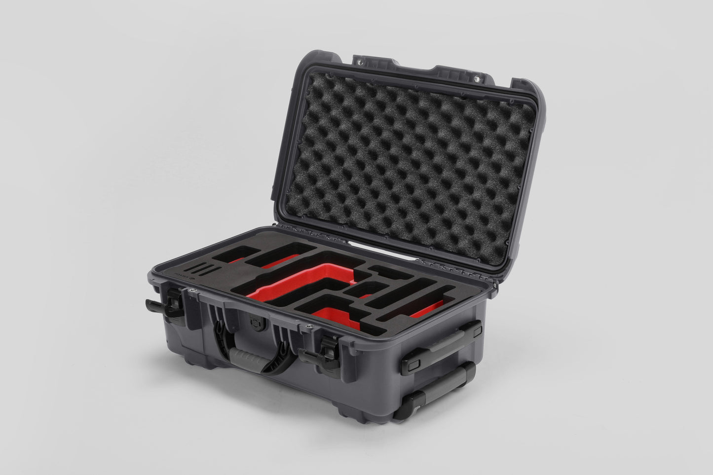 Angled view of Foama Graphite Color Travel Case and Custom Foam Insert with Red Layer for RED Monstro