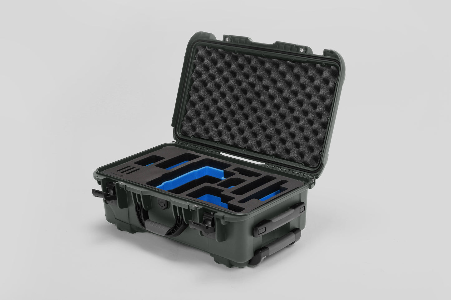 Angled view of Foama Olive Color Travel Case and Custom Foam Insert with Blue Layer for RED Monstro