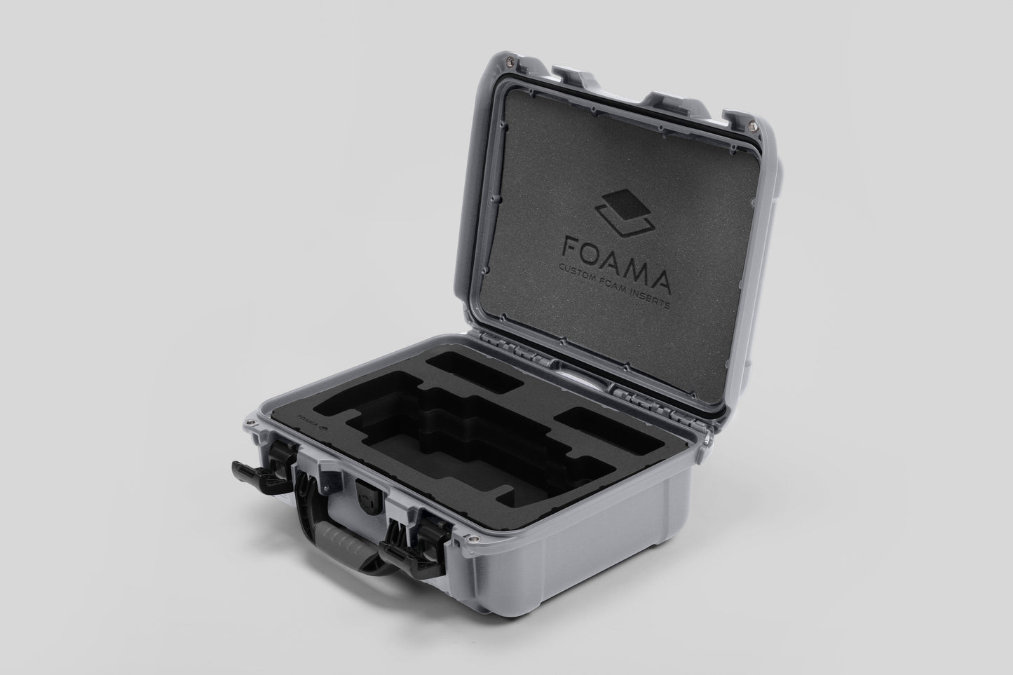 Angled view of Foama Silver Color Travel Case and Custom Foam Insert for SmallHD 703 Bolt Pro