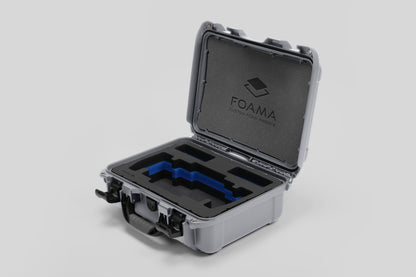 Angled view of Foama Silver Color Travel Case and Custom Foam Insert with Blue Layer for SmallHD 703 Bolt Pro