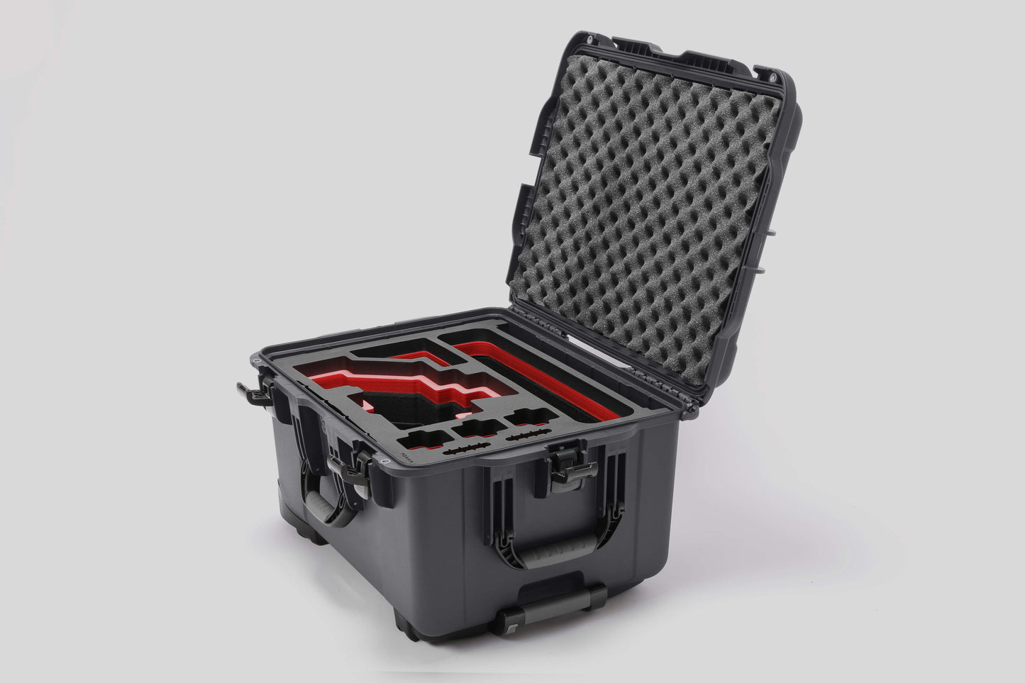 Angled view of Sony FX6 Graphite Color Studio Case and Custom Foam Insert with a Red Layer