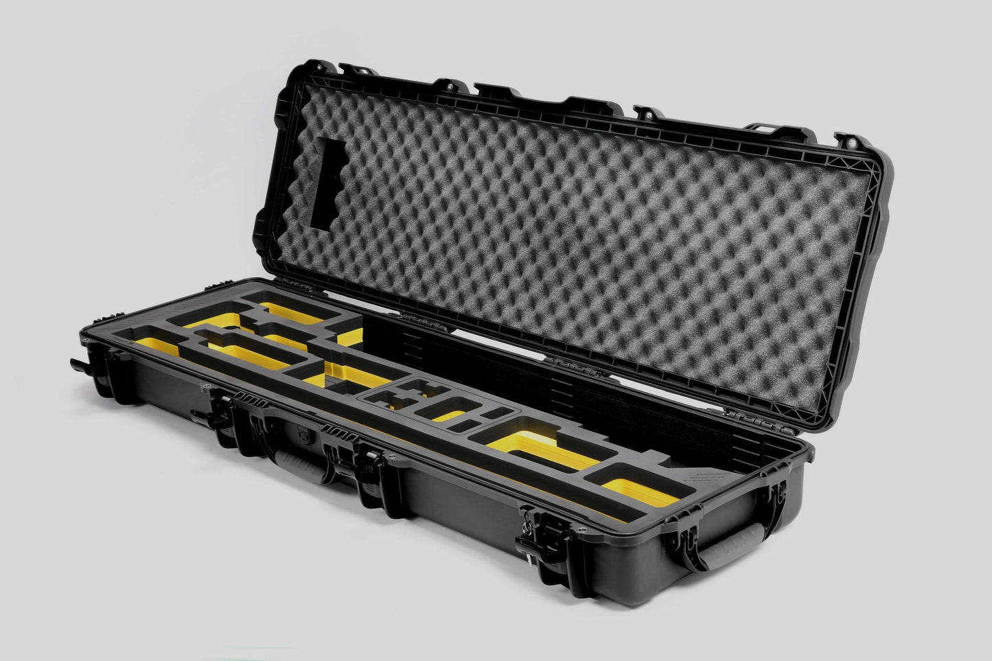 Angled view of Foama Fortified Black Color Hard Case and Custom Foam Insert with Yellow Layer for DJI D-RTK 2 Mobile Station