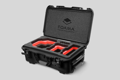 Angled view of Foama Black Color Carry-on case and Custom Foam Insert with Red Layer for RED Komodo-X