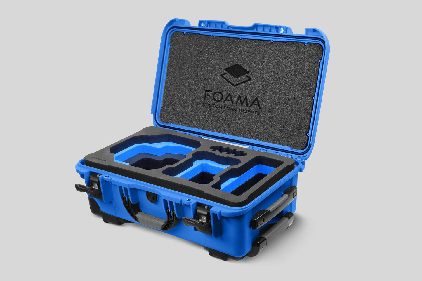 Angled view of Foama Blue Color Carry-on case and Custom Foam Insert with Blue Layer for RED Komodo-X