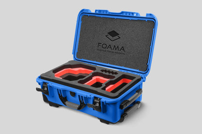 Angled view of Foama Blue Color Carry-on case and Custom Foam Insert with Red Layer for RED Komodo-X