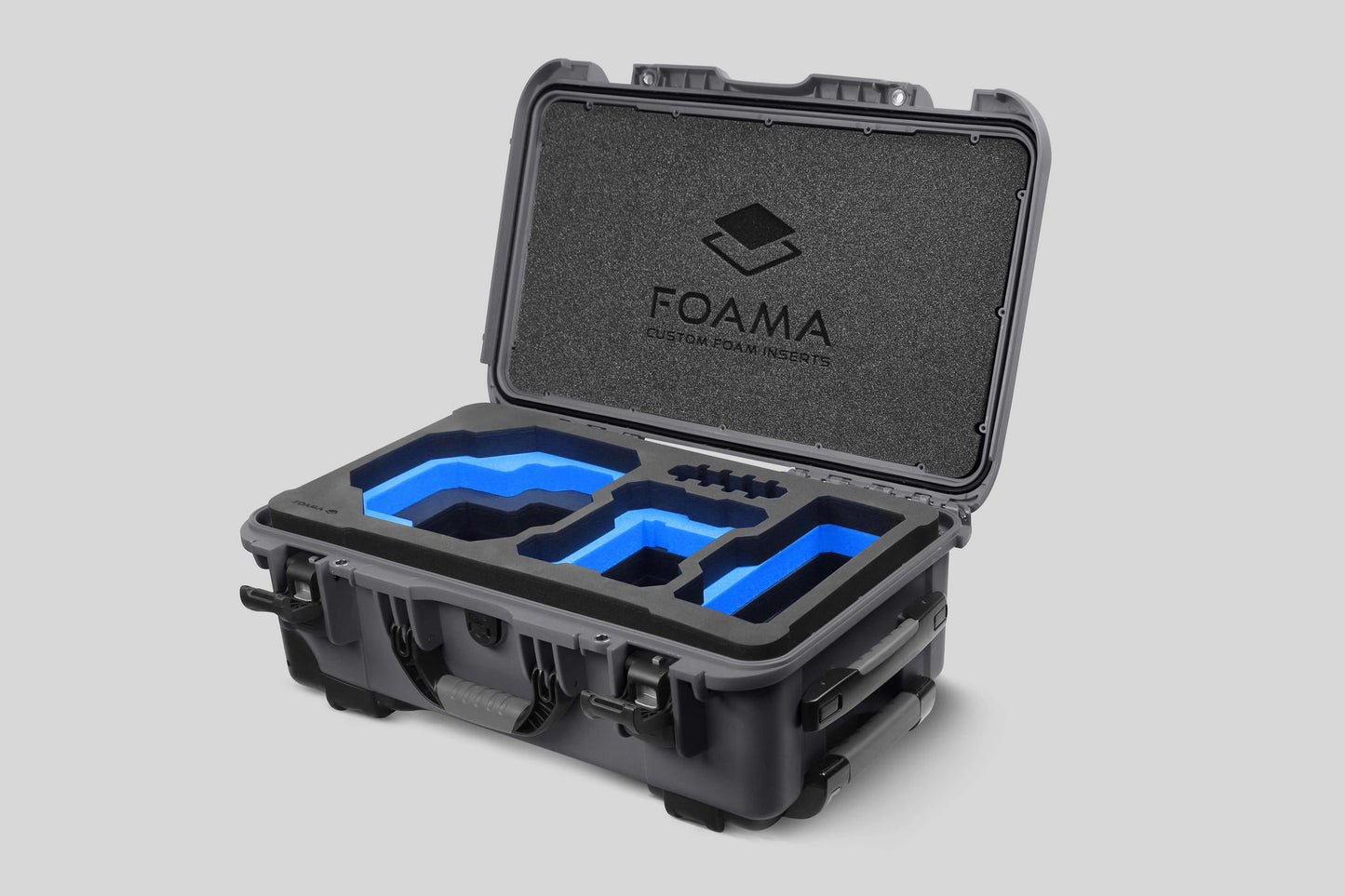Angled view of Foama Graphite Color Carry-on case and Custom Foam Insert with Blue Layer for RED Komodo-X