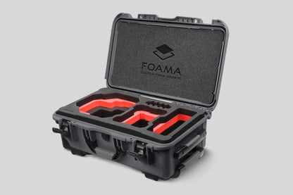 Angled view of Foama Graphite Color Carry-on case and Custom Foam Insert with Red Layer for RED Komodo-X