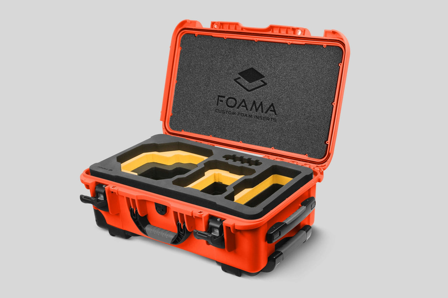 Angled view of Foama Orange Color Carry-on case and Custom Foam Insert with Yellow Layer for RED Komodo-X