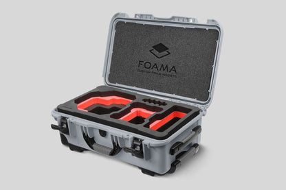 Angled view of Foama Silver Color Carry-on case and Custom Foam Insert with Red Layer for RED Komodo-X