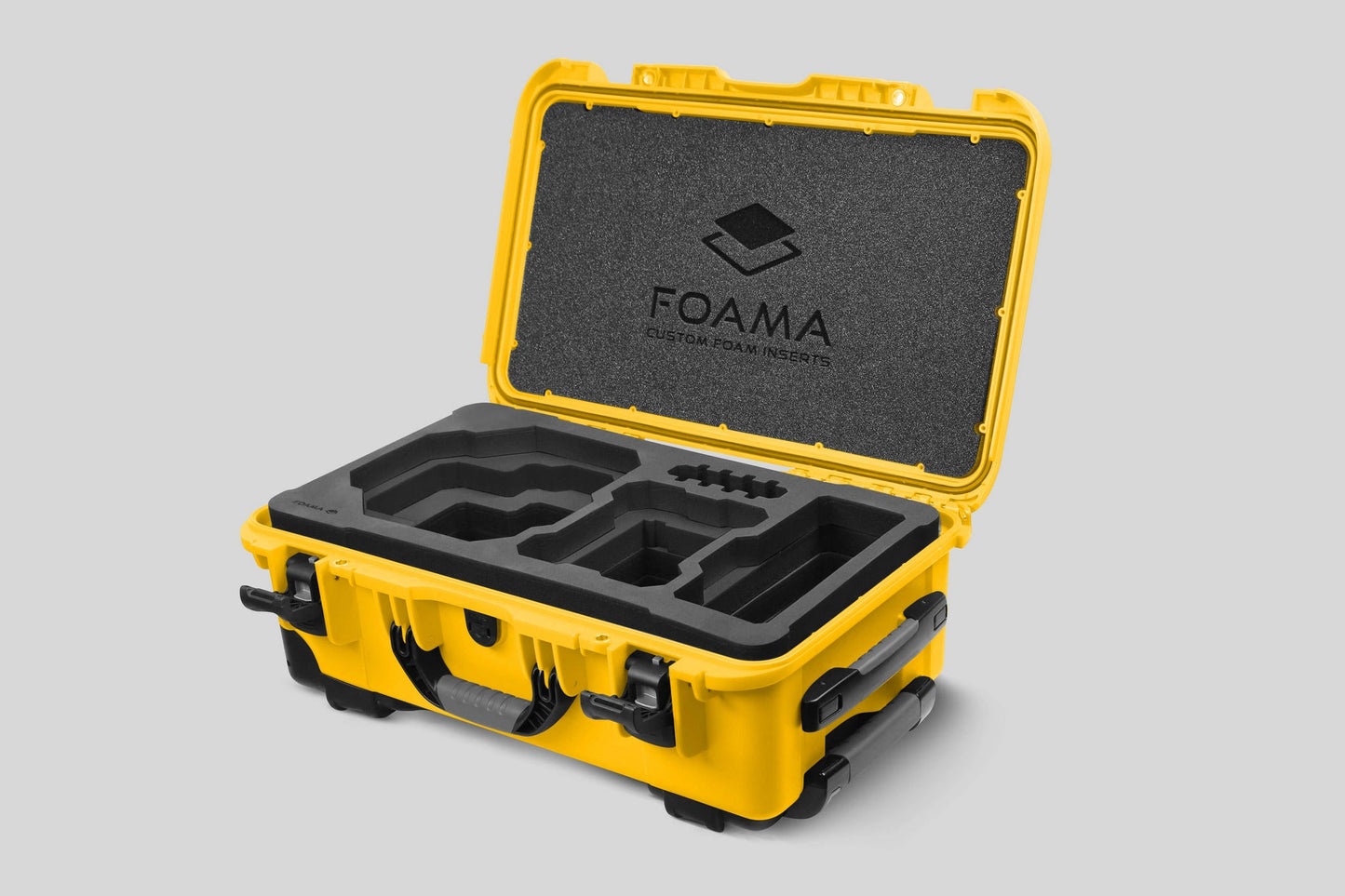 Angled view of Foama Yellow Color Carry-on case and Custom Foam Insert for RED Komodo-X
