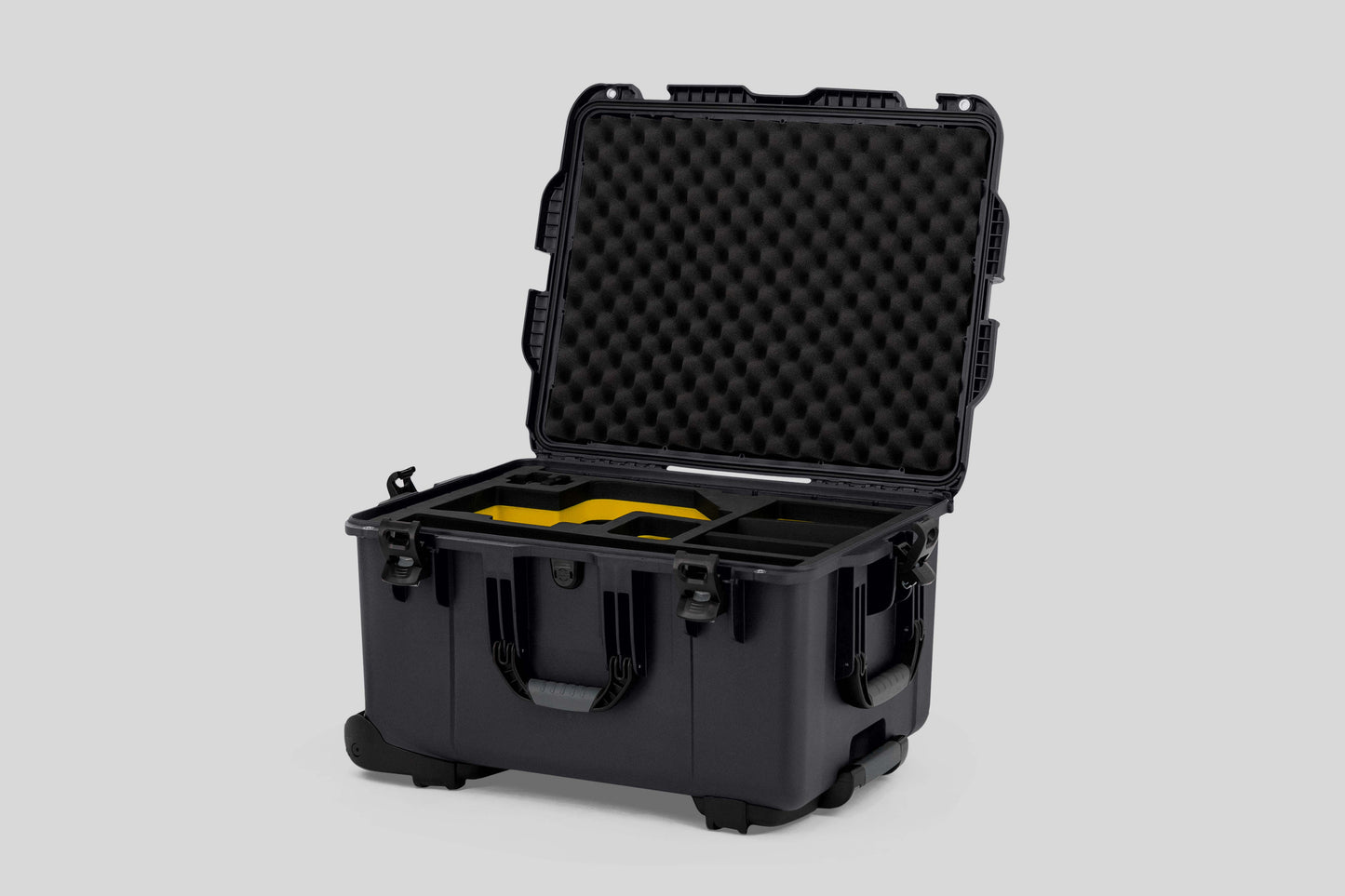 Angle view of Graphite Color Sony Burano Heavy Duty Roller Case and Custom Foam Insert with Yellow Layer for Burano Camera And Accessories