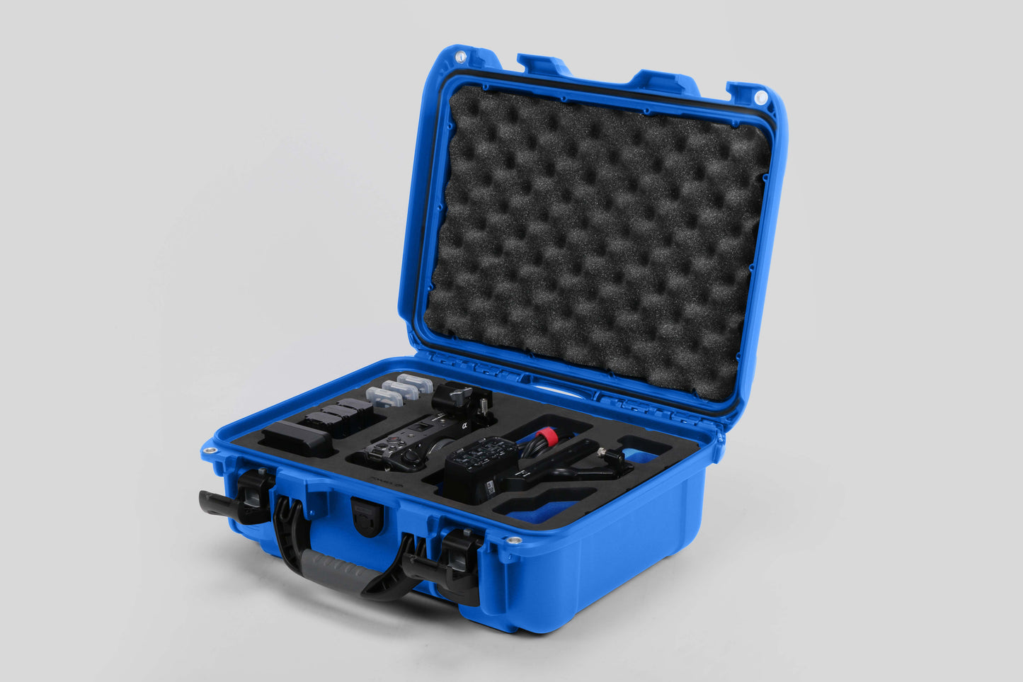 Angled view of Foama Blue Color Carry-on case and Blue Foam Insert for Sony FX-3 and Essential Accessories