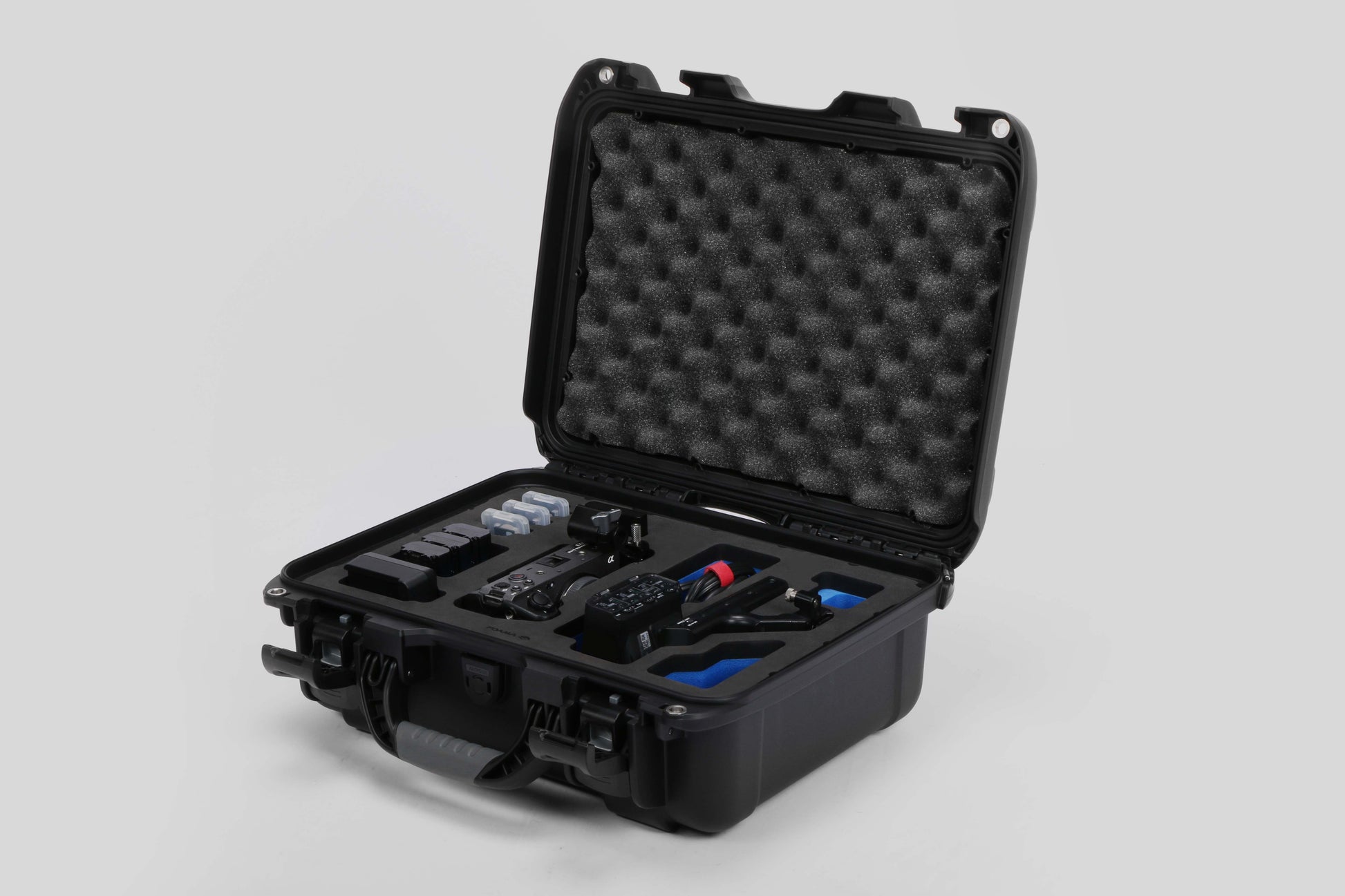 Angled view of Foama Black Color Carry-on case and Blue Foam Insert for Sony FX-3 and Essential Accessories