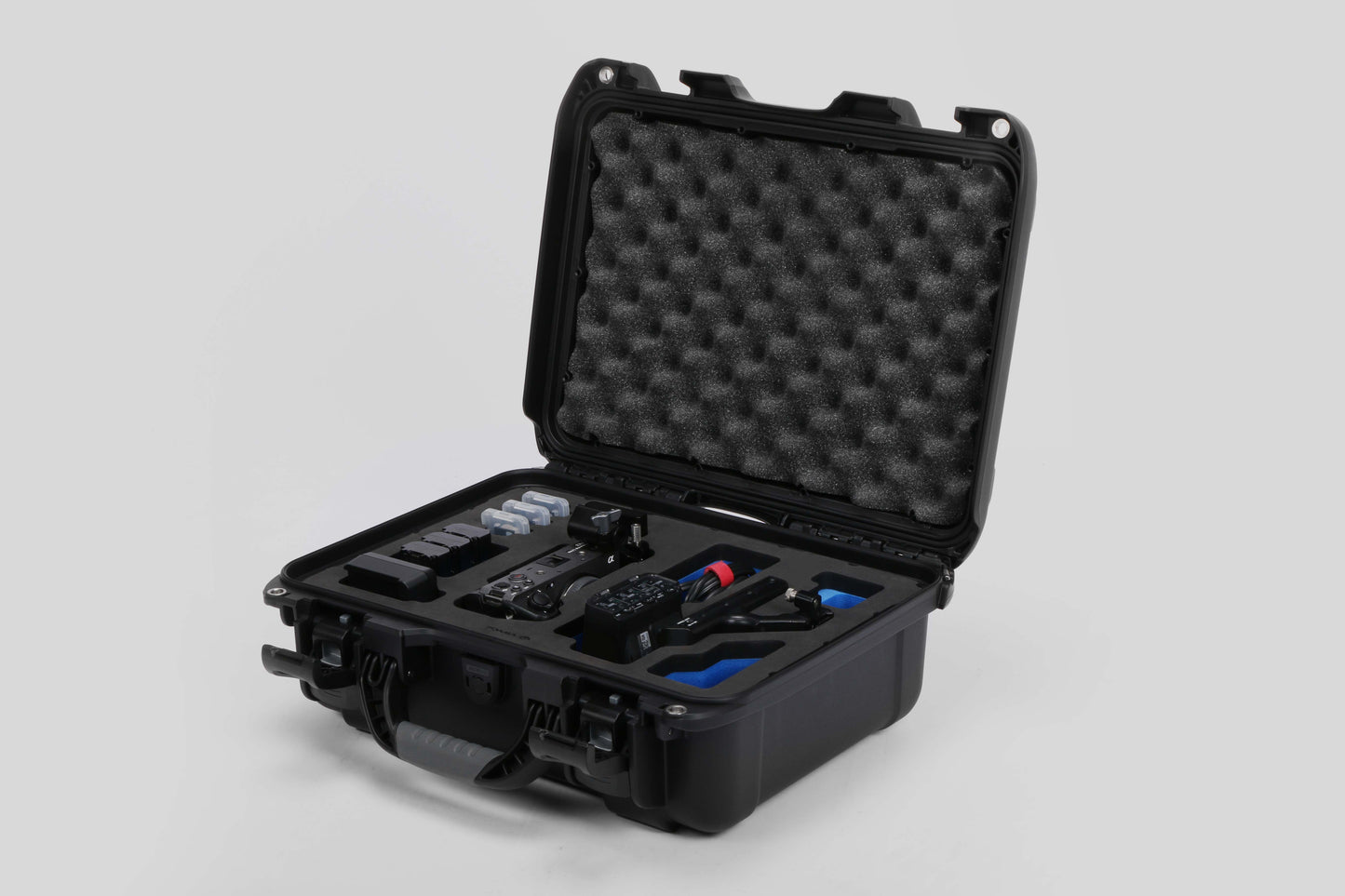 Angled view of Foama Black Color Carry-on case and Blue Foam Insert for Sony FX-3 and Essential Accessories