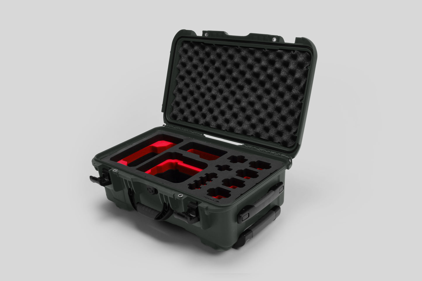 Angled view of Foama Olive Color Carry-on case and Custom Foam Insert with Red Layer for Sony FX-6