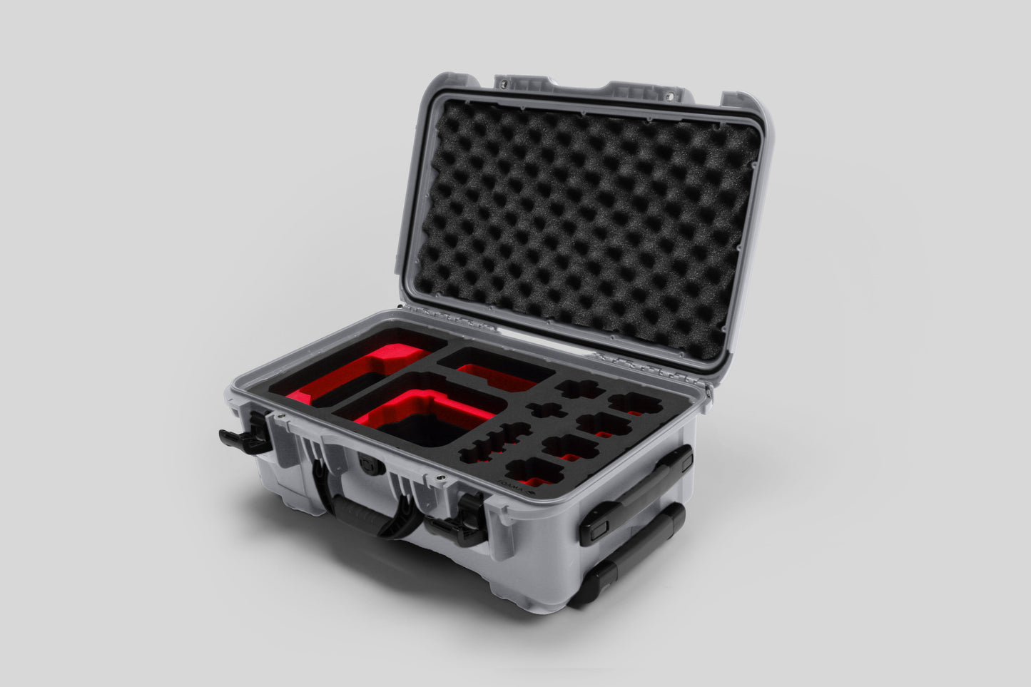 Angled view of Foama Silver Color Carry-on case and Custom Foam Insert with Red Layer for Sony FX-6