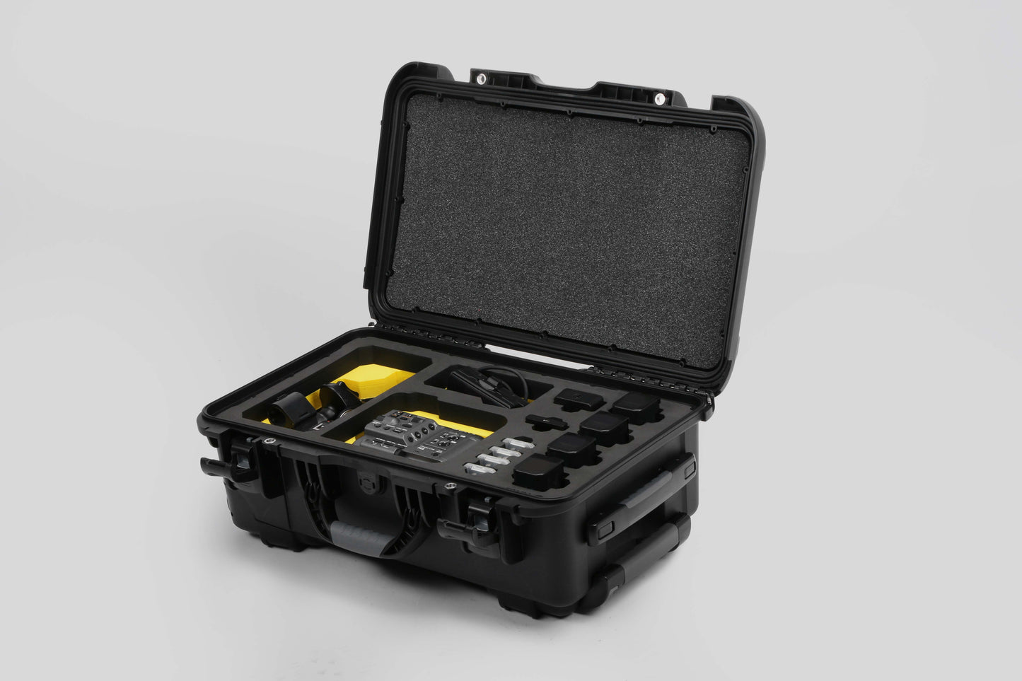 Angled view of Foama Black Color Carry-on case and Yellow Foam Insert for Sony FX-6 and Essential Accessories
