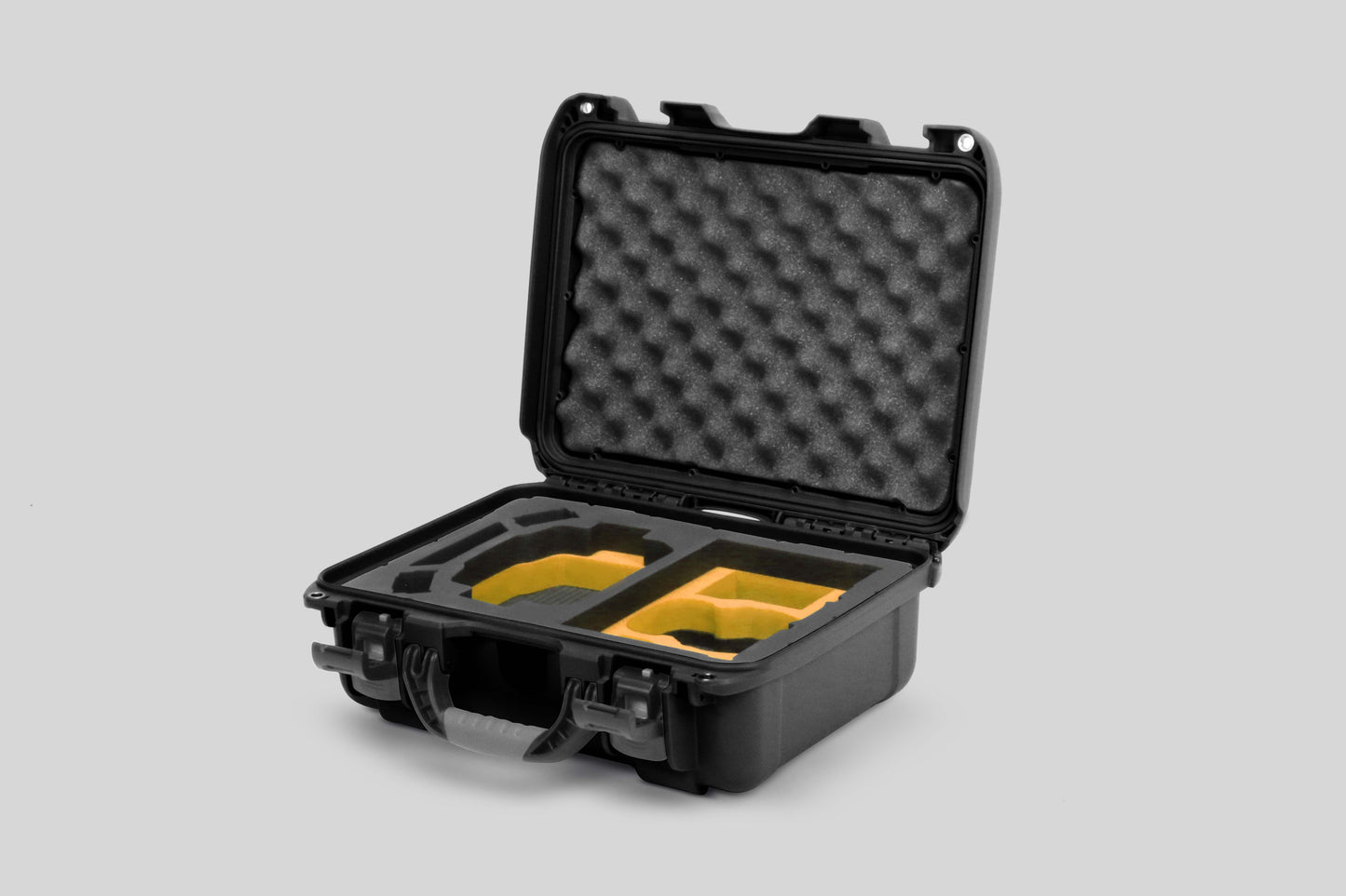 Angled View of a DJI Mini 3 & 4 Pro Black Color Hard Case with Custom Yellow Foam Insert