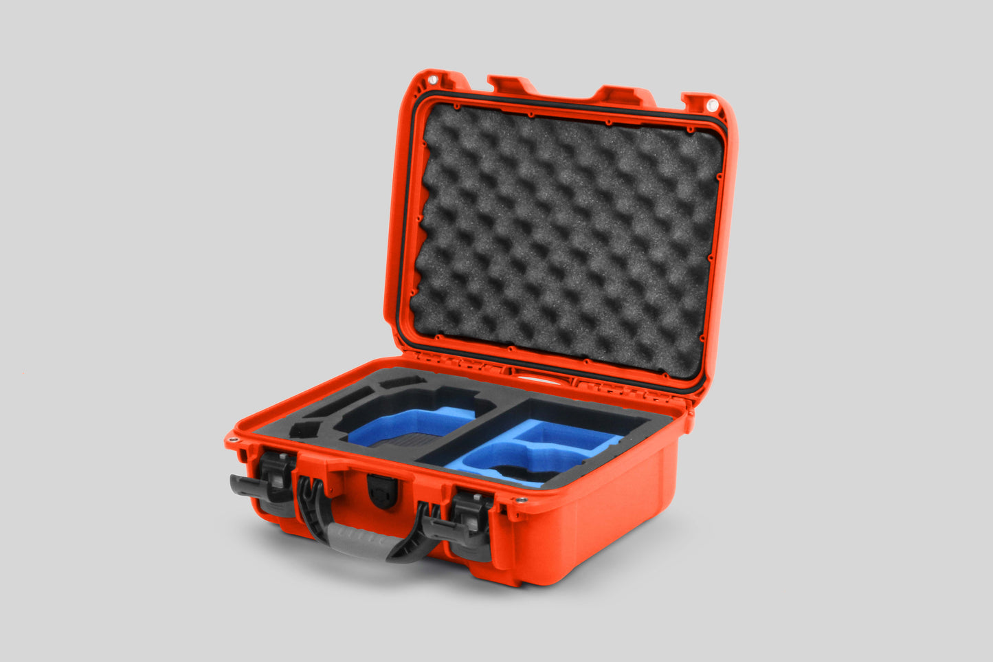 Angled view of Foama Graphite Color Hard Case and Custom Foam Insert with a Stylish Blue Layer for DJI Mini 3 & 4 Pro
